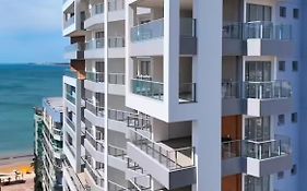 Apartamento NOvo na Praia do Morro Temporada Wi-Fi, Vista Mar, garagem, varanda grande